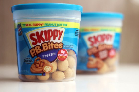 Two packages of Skippy P.B. Bites, one pretzel and one peanut butter