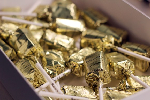 A box of See's Lollypops