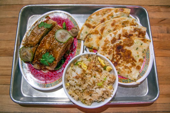 Steamed ribs with char siu glaze, scallion pancakes, and