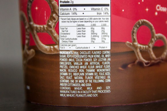 Ingredient information on the back of a Herr's chocolate-covered pretzels tub